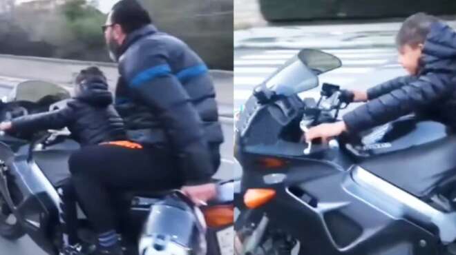 pateras-vazei-to-paidi-toy-na-odigisei-michani-choris-kranos-me-terma-to-gkazi-ki-apo-piso-aytos-kapnizei-105422