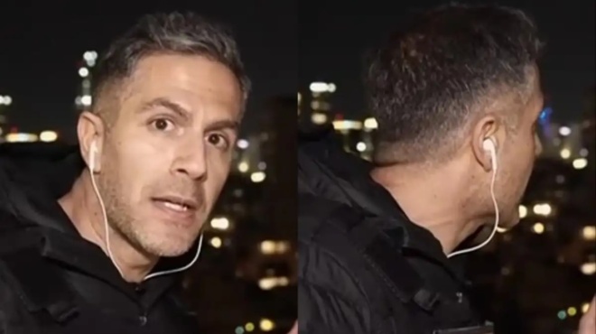 sok-ston-aera-kopike-i-anasa-tis-paroysiastrias-i-stigmi-poy-pyraylos-sto-israil-peranei-pano-apo-to-kefali-toy-dimosiografoy-toy-skai-kai-skaei-piso-toy-https-ww-458093